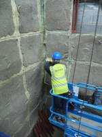 Martin fitting the Bendcrete Panels at Bolton One